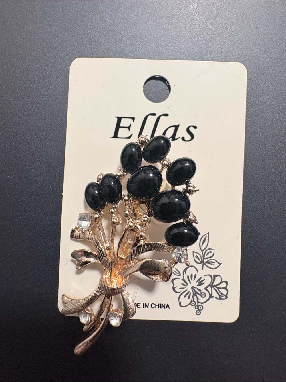 Ella Gold-Tone Floral Brooch with Black Cabochons